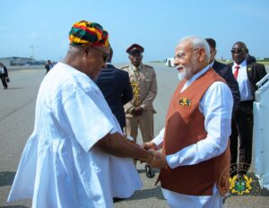 President John Dramani Mahama welcomes Prime Minister Narendra Modi at the airport Wednesday afternoon in Accra.