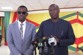 Minority Chief Whip and Member of Parliament for Bodi, Richard Boamah(right)